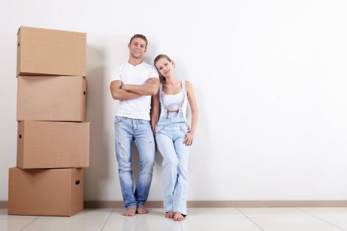 Customer placing items into a secure storage unit at the start of a booking